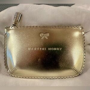 Anya Hindmarch purse gold tone shiny
"Martini Money"